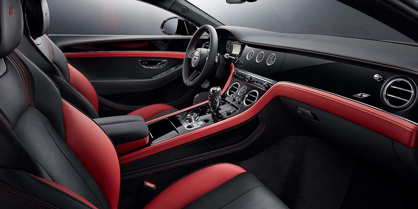 Bentley Basel Bentley Continental GT S coupe front interior in Beluga black and Hotspur red hide with high gloss Carbon Fibre veneer