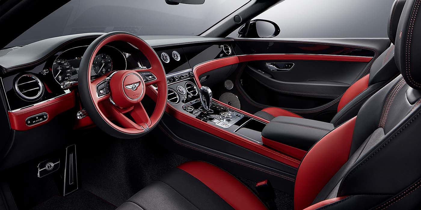 Bentley Basel Bentley Continental GTC S convertible front interior in Beluga black and Hotspur red hide with high gloss carbon fibre veneer
