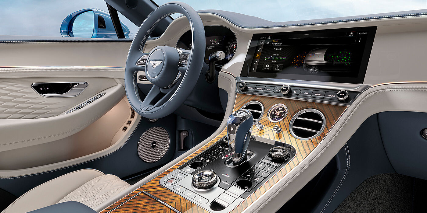 Bentley Basel New Bentley Continental GTC Azure convertible interior front cabin view with Linen and Brunel hides and Piano Linen by Mulliner veneer featuring centre console and centre MMI screen