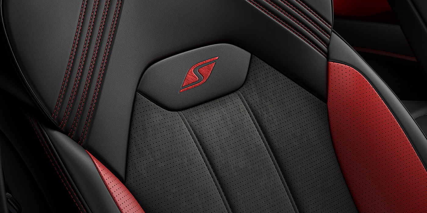 Bentley Basel Bentley Bentayga S seat with detailed red Hotspur stitching and black Beluga coloured hide. 