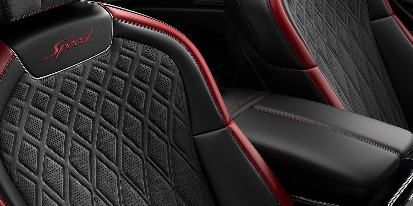 Bentley Basel Bentley Flying Spur Speed sedan seat stitching detail in Beluga black and Cricket Ball red hide
