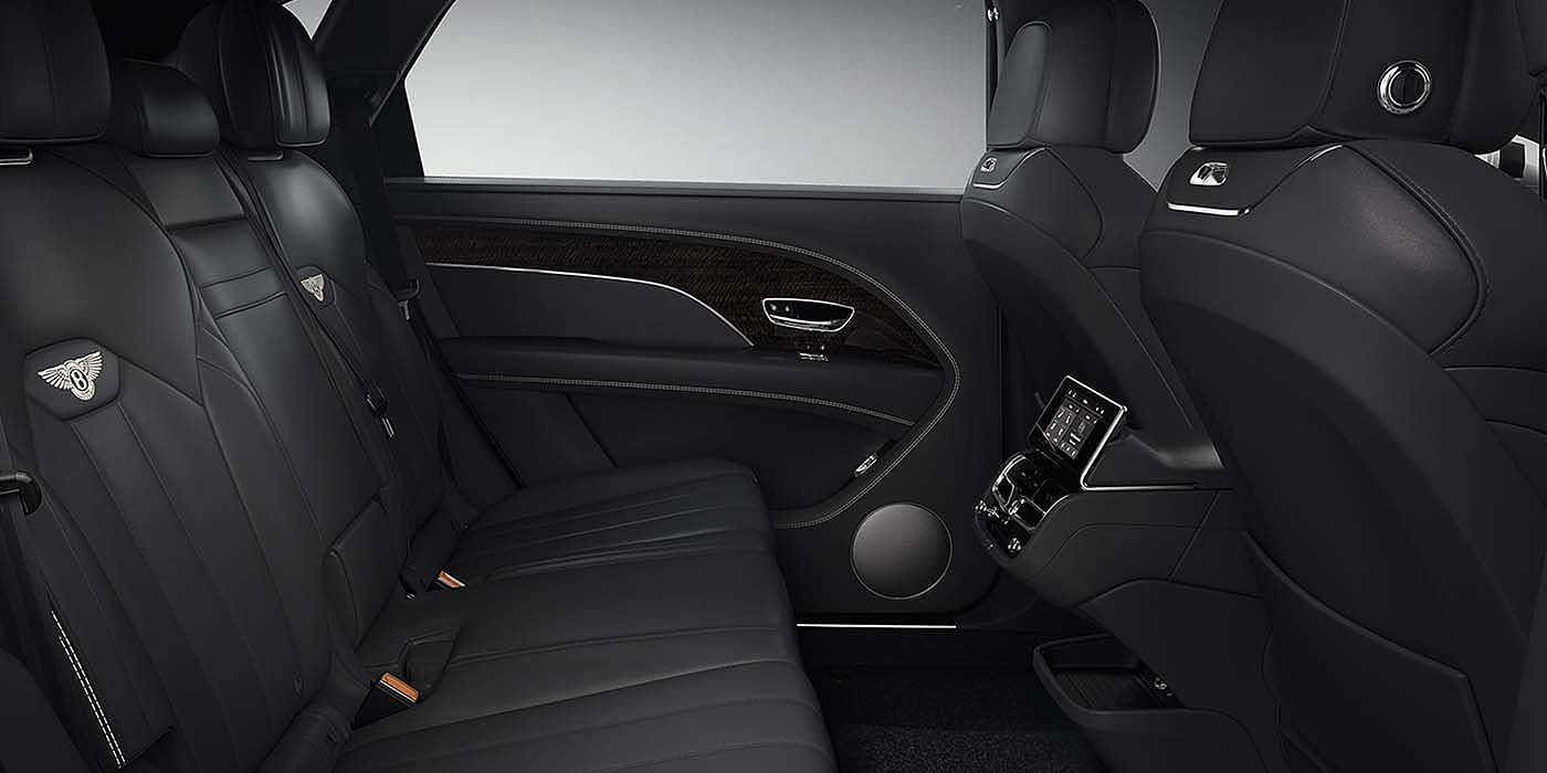 Bentley Basel Bentley Bentayga EWB SUV rear interior in Beluga black leather