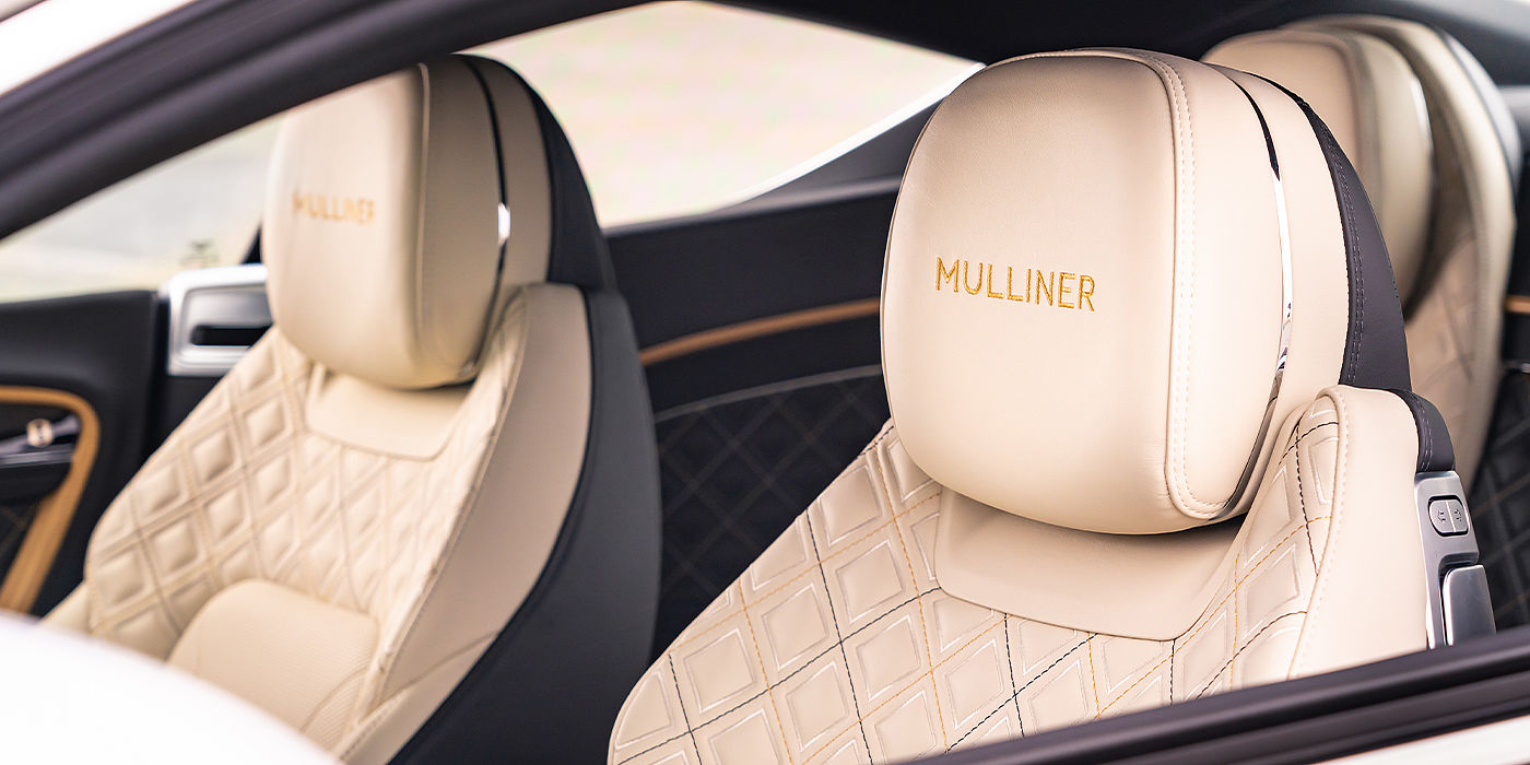 Bentley Basel Bentley Continental GT Mulliner coupe seat detail in Beluga black and Linen hide