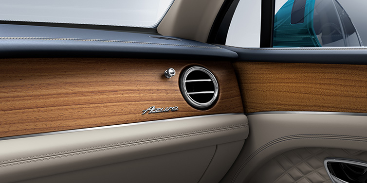 Bentley Basel Bentley Bentayga Extended Wheelbase Azure front dash showing Open Pore Koa veneer surrounded by Portland and Imperial Blue hides